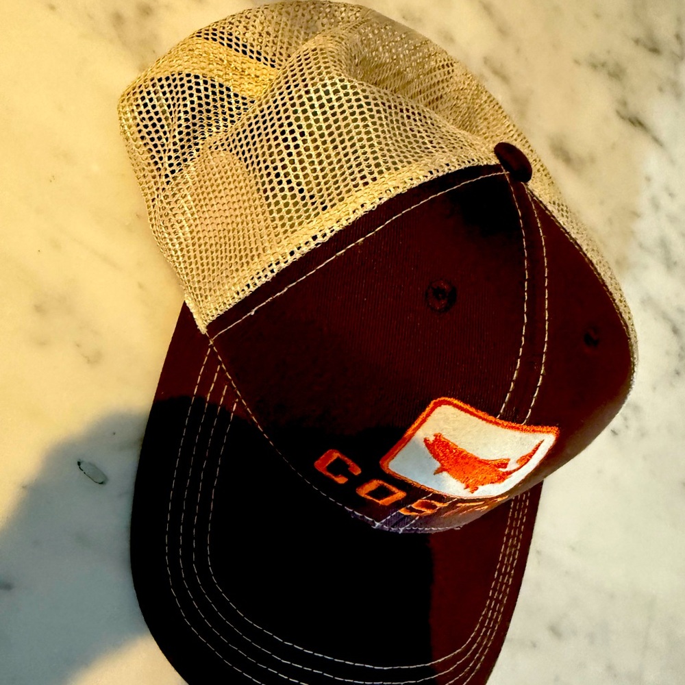 New Costa cap